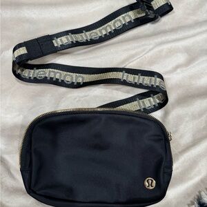 lululemon Black Belt Bag with Gold Accents